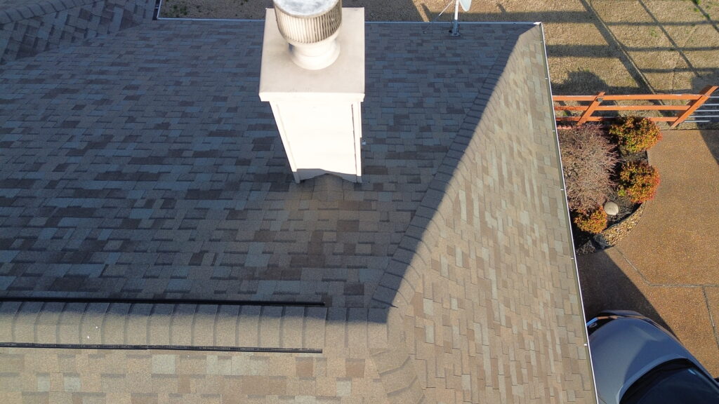 Asphalt shingle roofing installed on a modern residential home