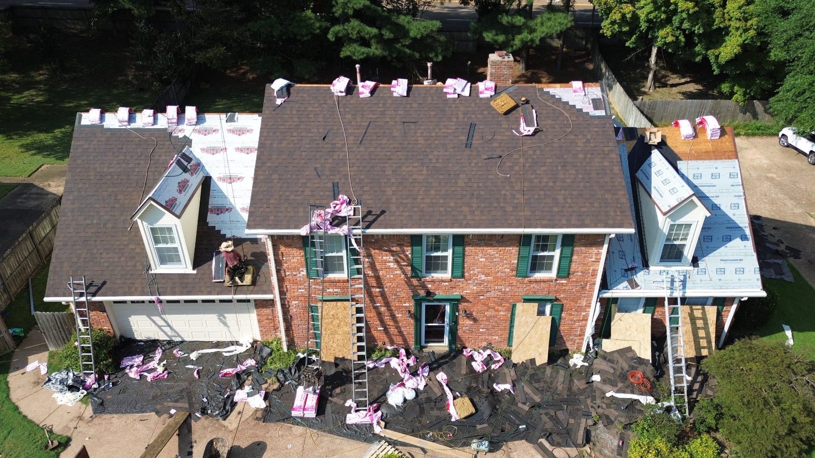 New architectural shingles going on a brick colonial in Germantown TN