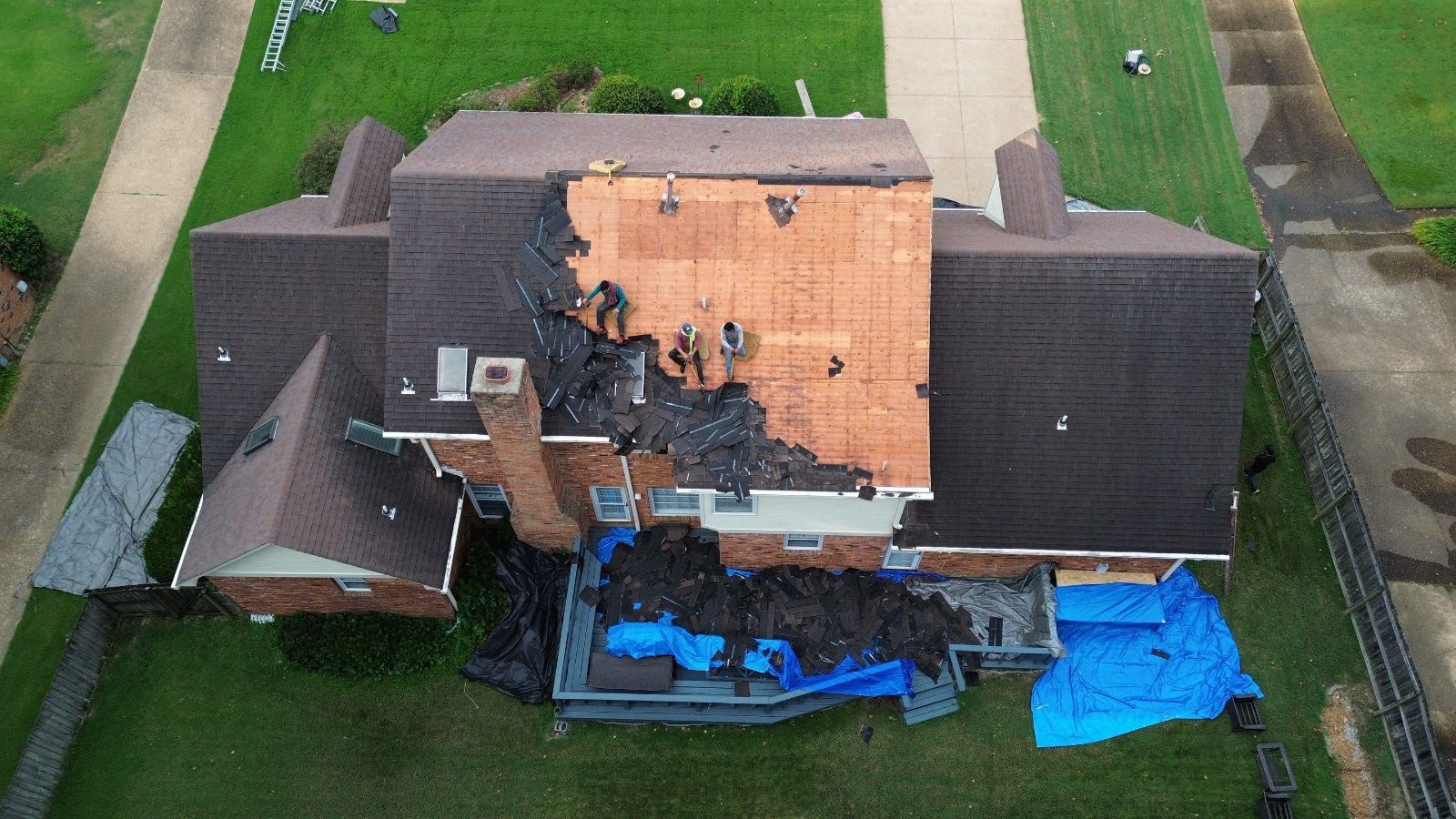 Drone view of a roof tear-off on a two-story home in Germantown TN
