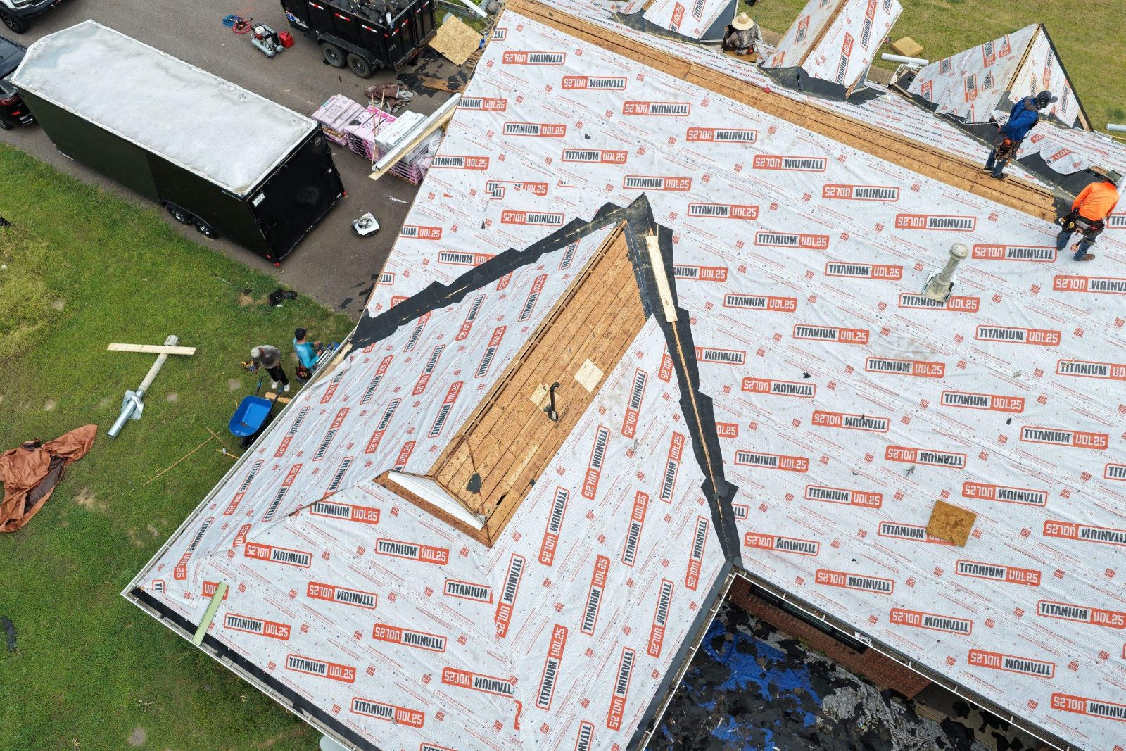 Drone view of synthetic underlayment on a Hernando MS roof replacement
