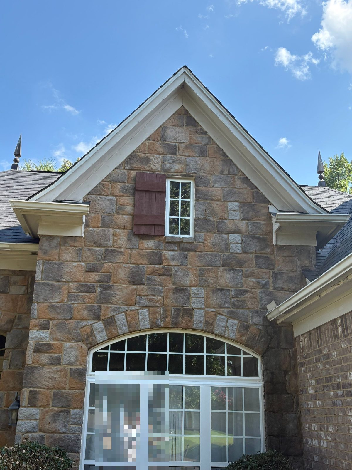 New roof above a stone gable in Cordova TN