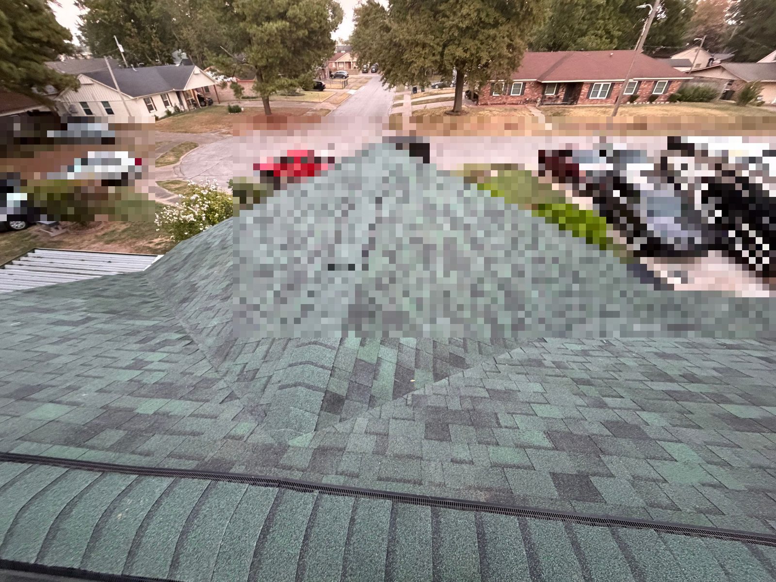 Finished green shingle roof in West Memphis AR