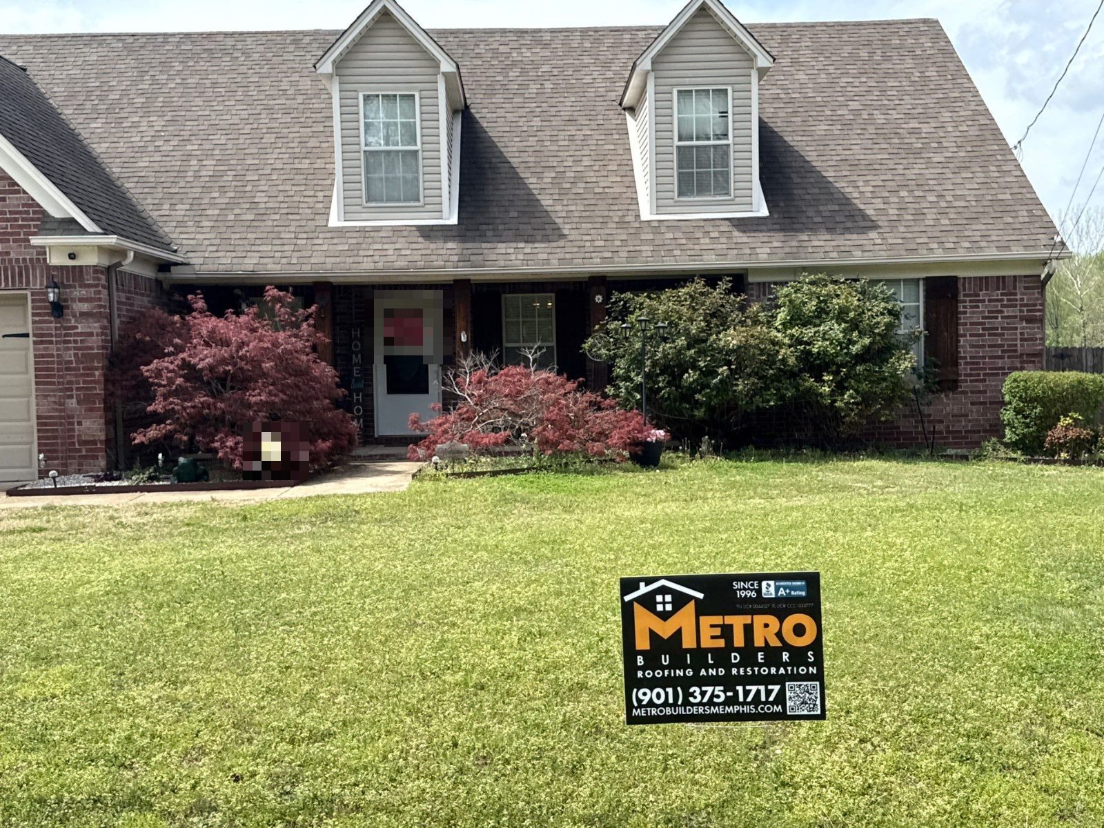 Metro Builders yard sign in front of a Millington TN home