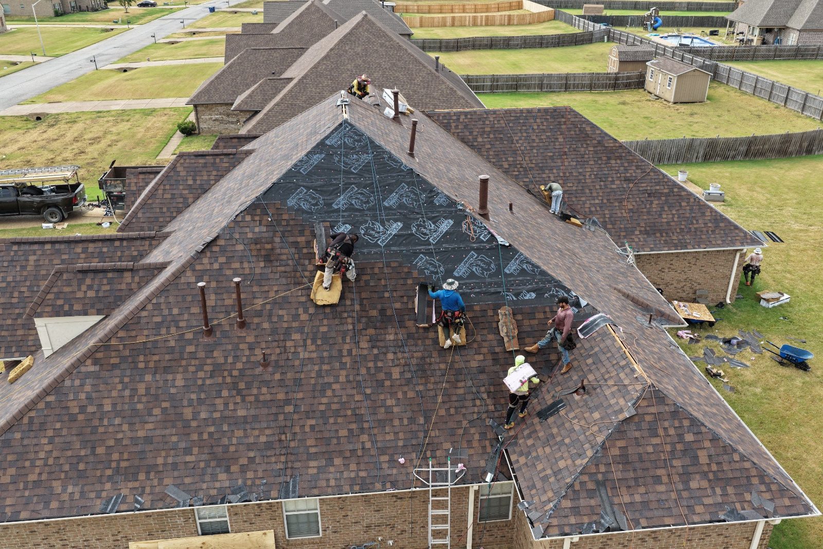 Drone view of the Metro Builders crew installing a new roof in Olive Branch MS