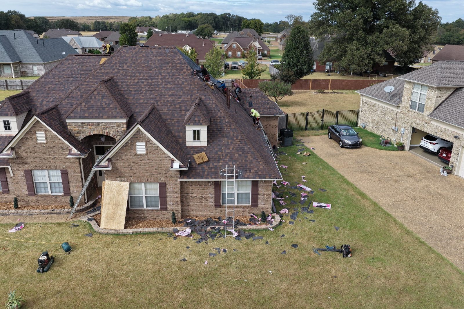 Drone view of a roof replacement on a brick home in Olive Branch MS