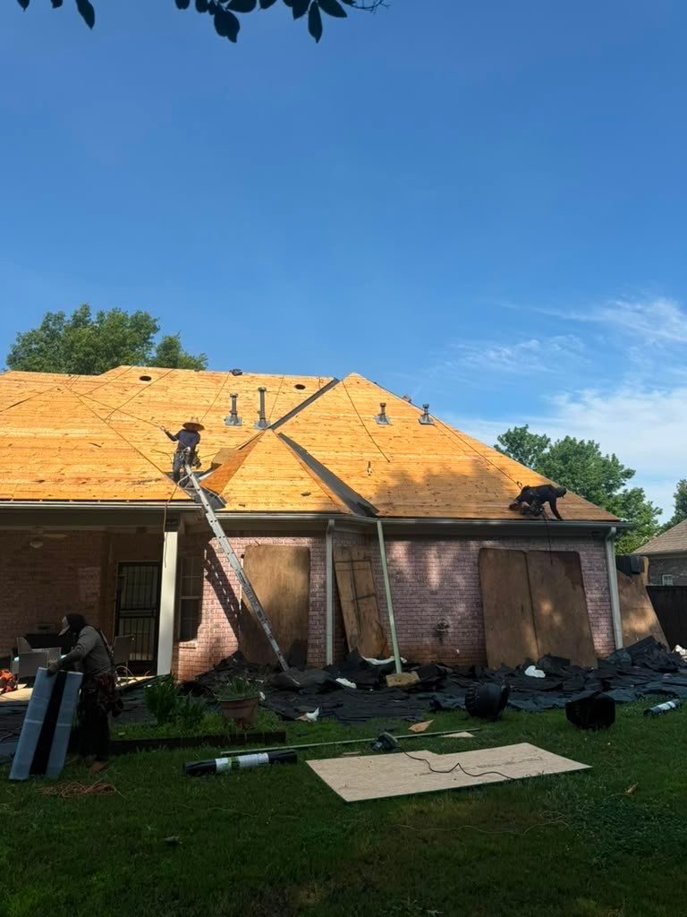 Crew installing new roof decking on a Southaven MS home